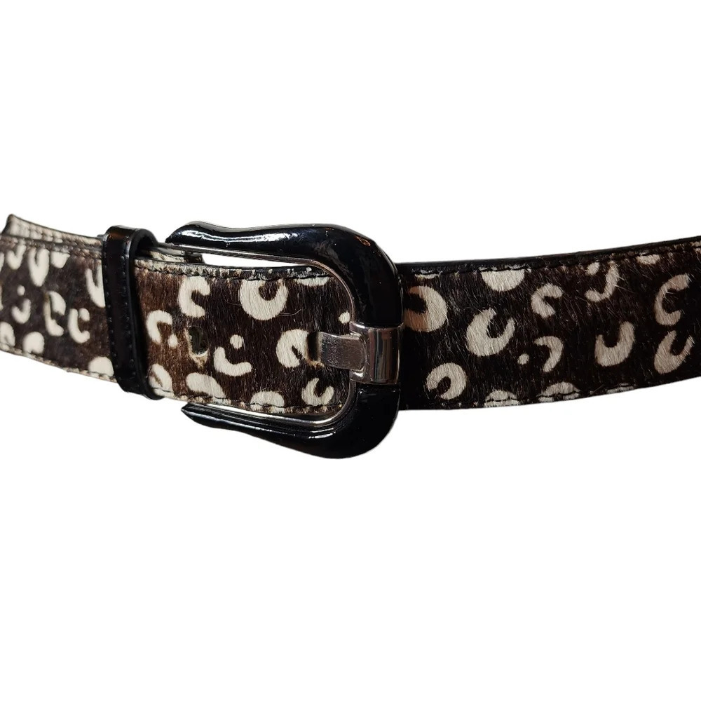 100% calf hair leather dark brown, white spotted belt.